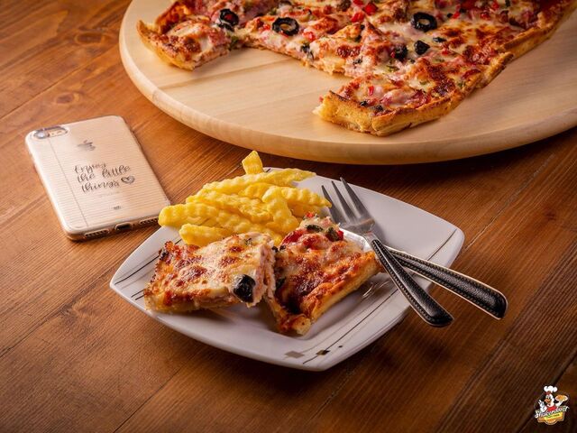 پیتزا در فست فود میخوش اندرزگو