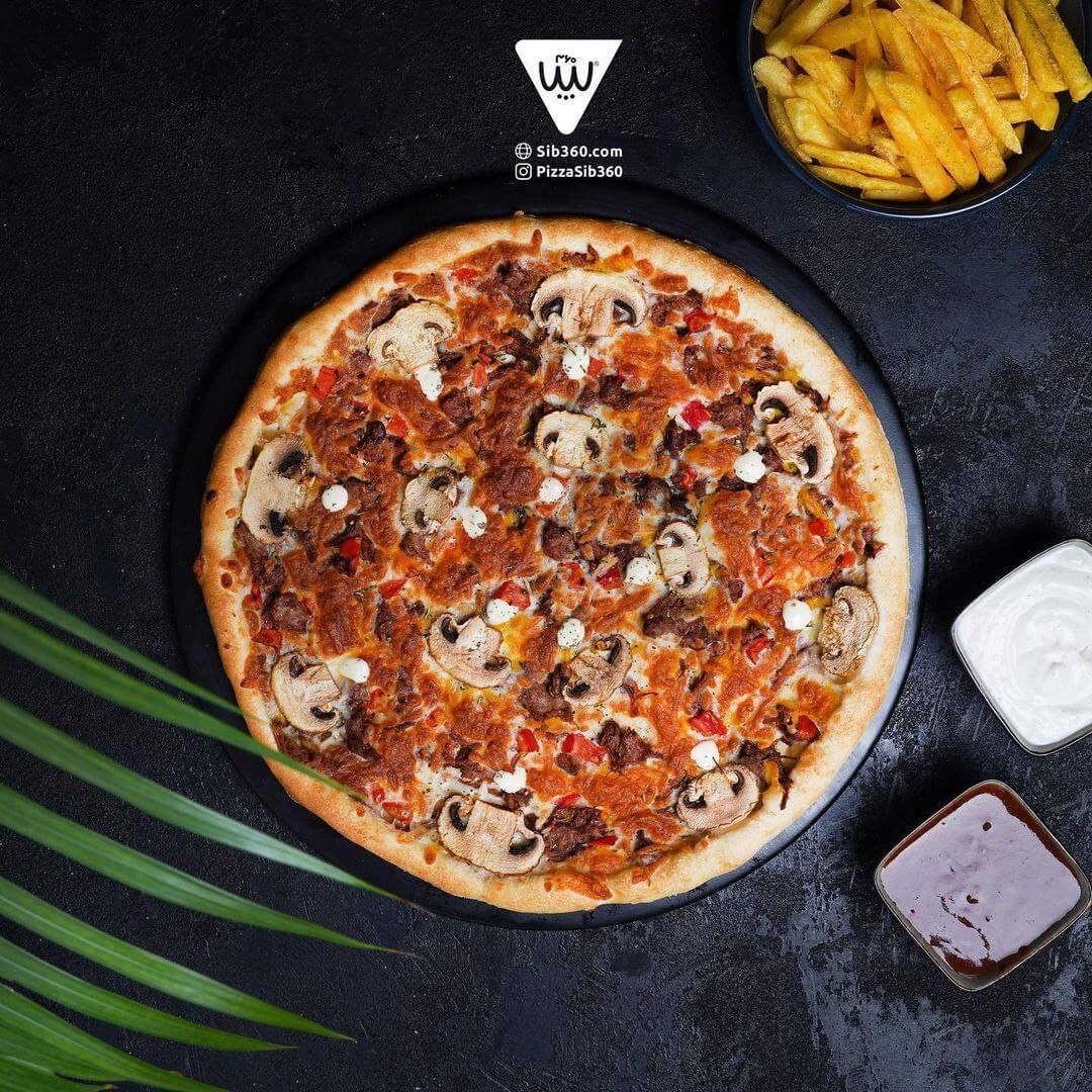 پیتزا ایتالیایی گرد خوش طعم با نان برشته و نازک در سیب 360 ایران مال